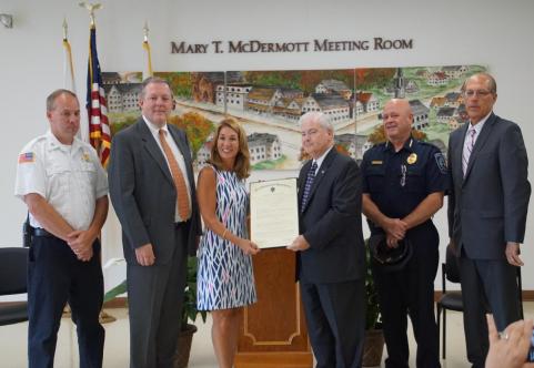 Board of Selectmen Chairman Francis Hegarty and Lt. Governor Karyn Polito signing the Commonwealth Community Compact on July 26, 2016
